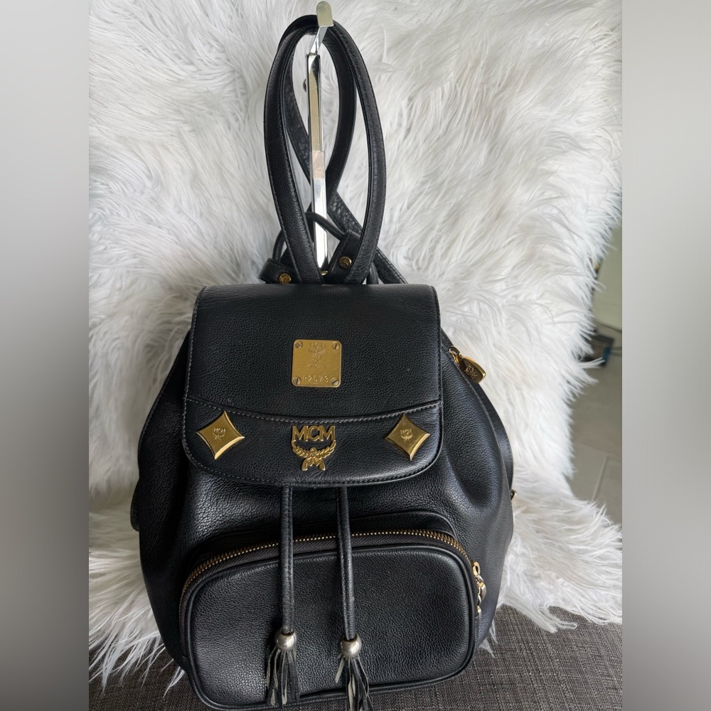 MCM Black Leather Mini Backpack with Gold Accents